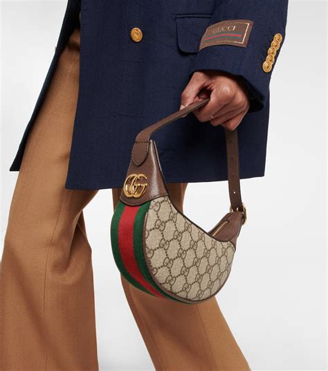 gucci 9505193400|GG mini shoulder bag with cat detail .